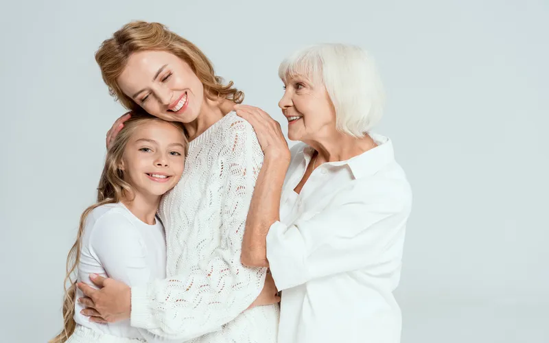 photo of three generations standing together