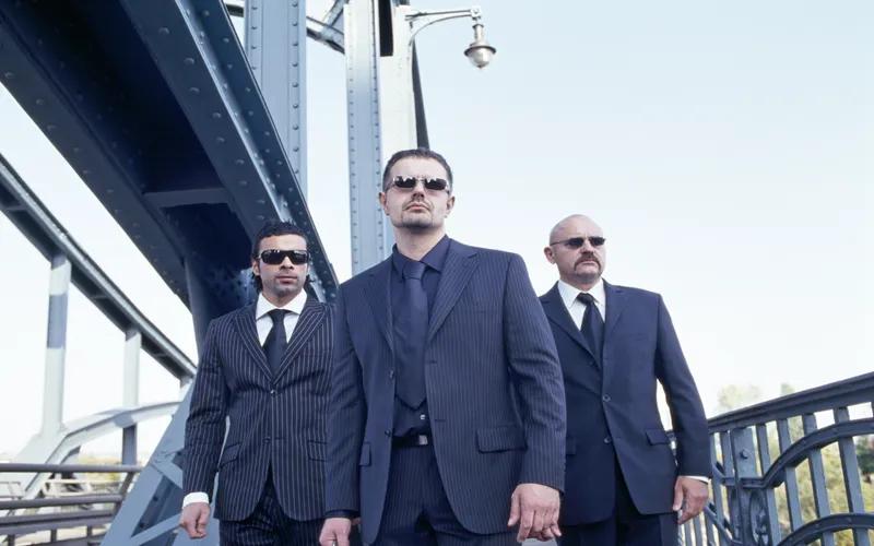 groomsmen against an urban backdrop