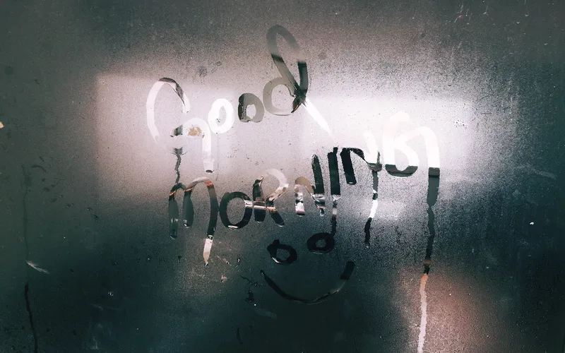 picture of foggy glass with good morning written on it