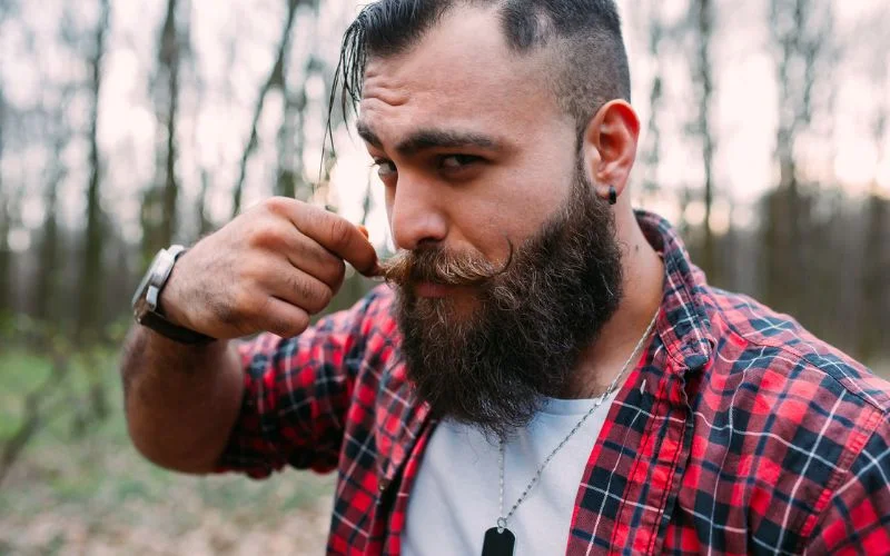 hand poses for pictures touching moustache