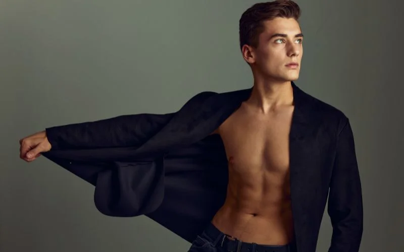 hand poses for pictures while flexing body