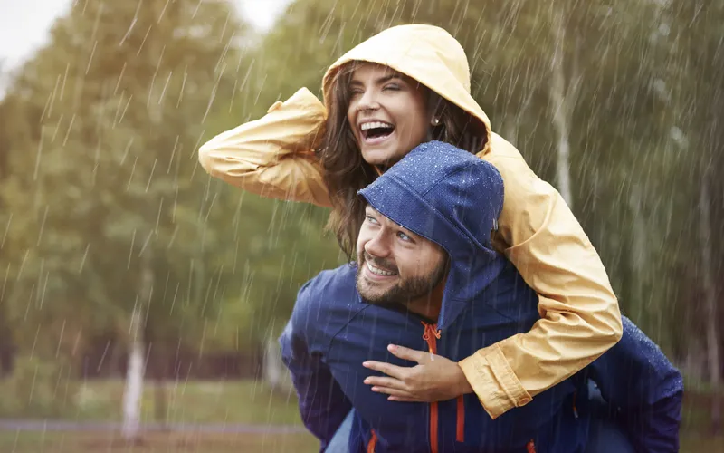 couple enjoying in the rain