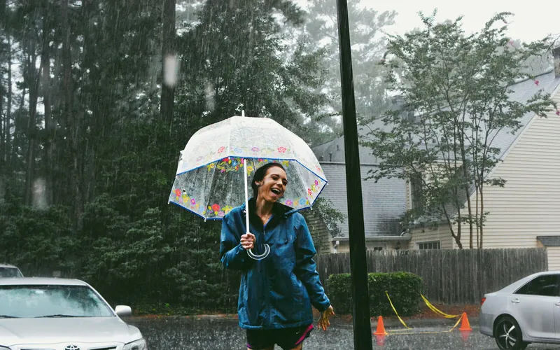 women holding an umbrella in the rain