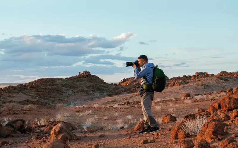 a photographer capturing beautiful landscape