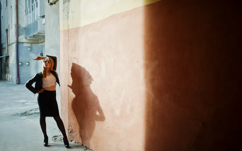 photo of a women taken during midday in harsh lights