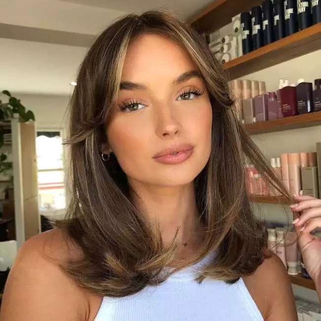 The Fun & Flirty Hair Flip for cute Instagram poses