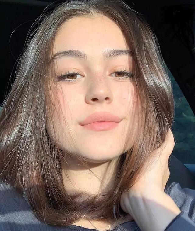 The Fun & Flirty Hair Flip for cute selfie poses