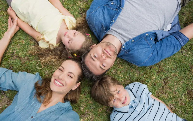 Lying Down on the Grass Family Photoshoot Spring,