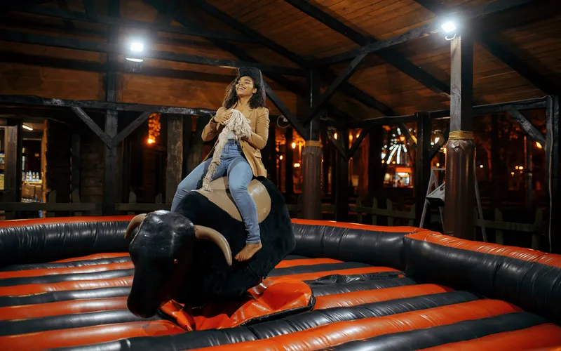 Bull rider captured with slight motion blur at 1/30 sec for a dynamic, creative effect