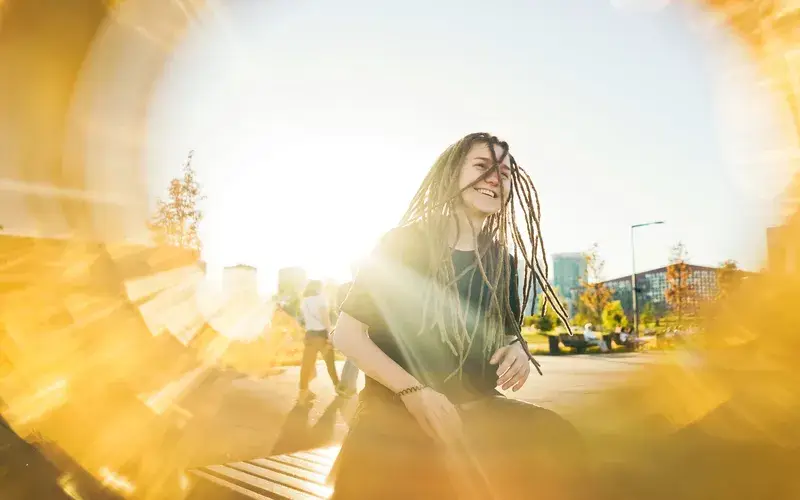 photo taken with lens flare of women smiling