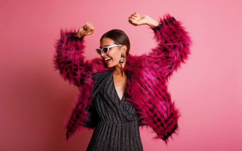 fluid fashion pose with arms out