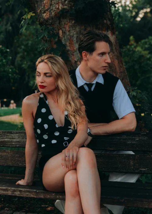 seated together power couple pose