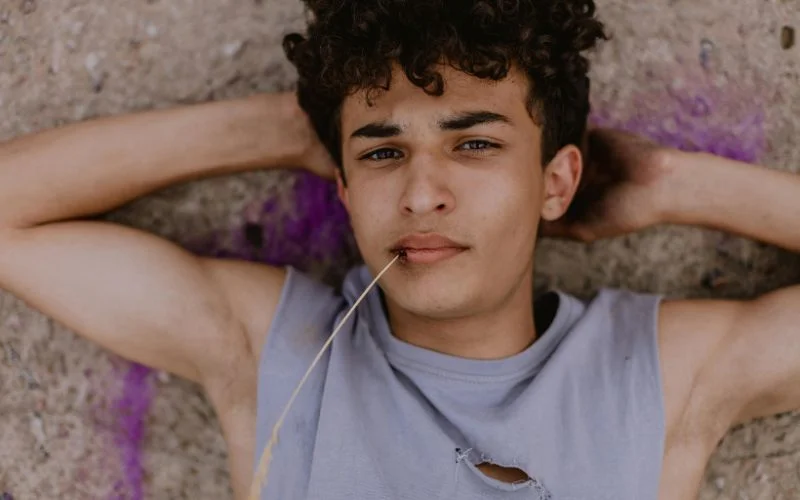 male model lying down for whimsy photo