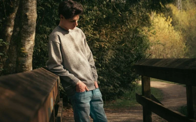 male model posing with hands in pocket
