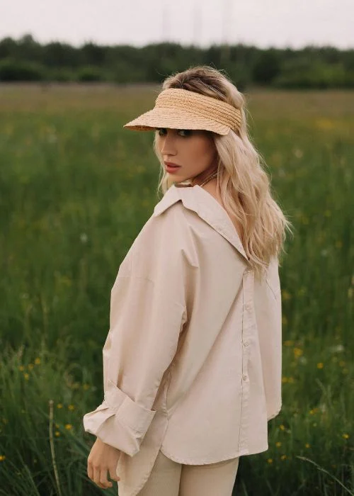 over the shoulder fashion pose for females