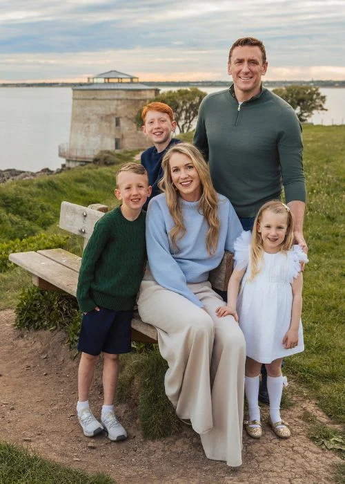 Happy family portrait showcasing authentic connection and storytelling photography