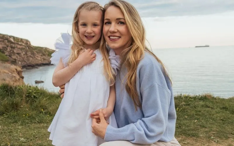 Mother and daughter portrait showcasing relaxed family photography posing techniques