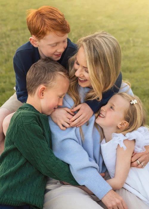 Outdoor family photography posing example with relaxed and playful interaction