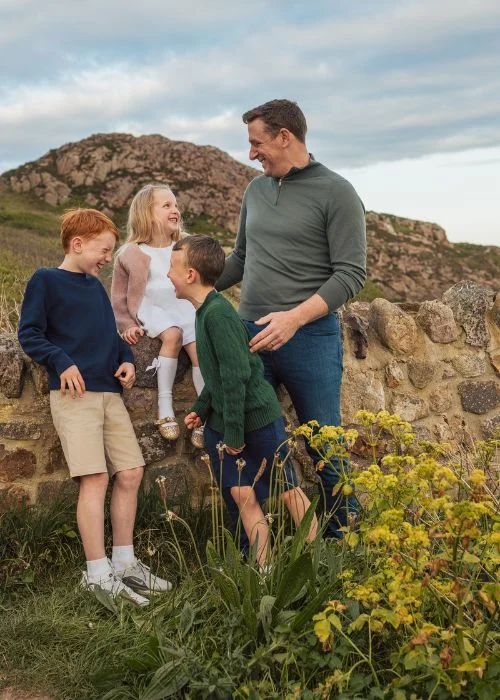 Family portrait session with natural light and emotional candid moments