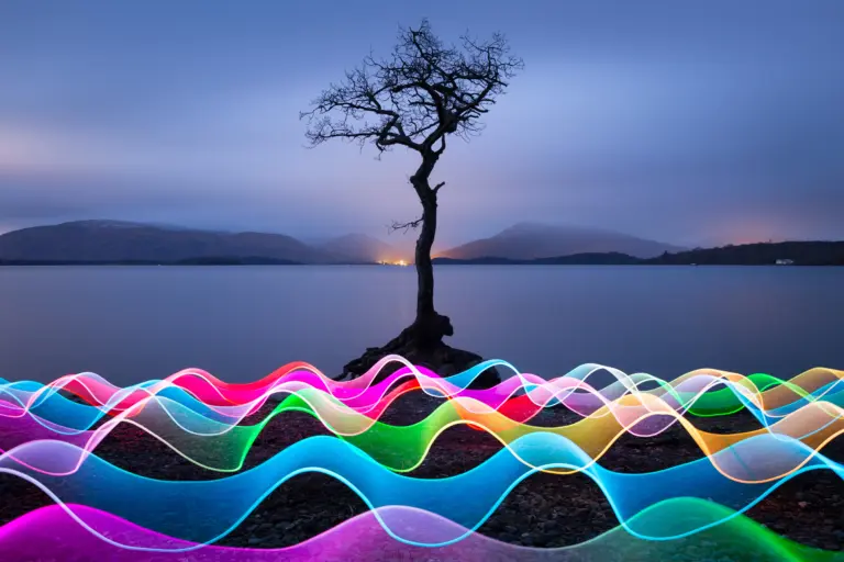 Vibrant light trails in a creative light painting landscape scene