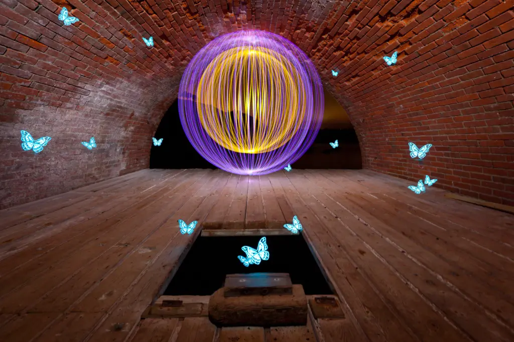 Long exposure light painting orb photographed inside a tunnel