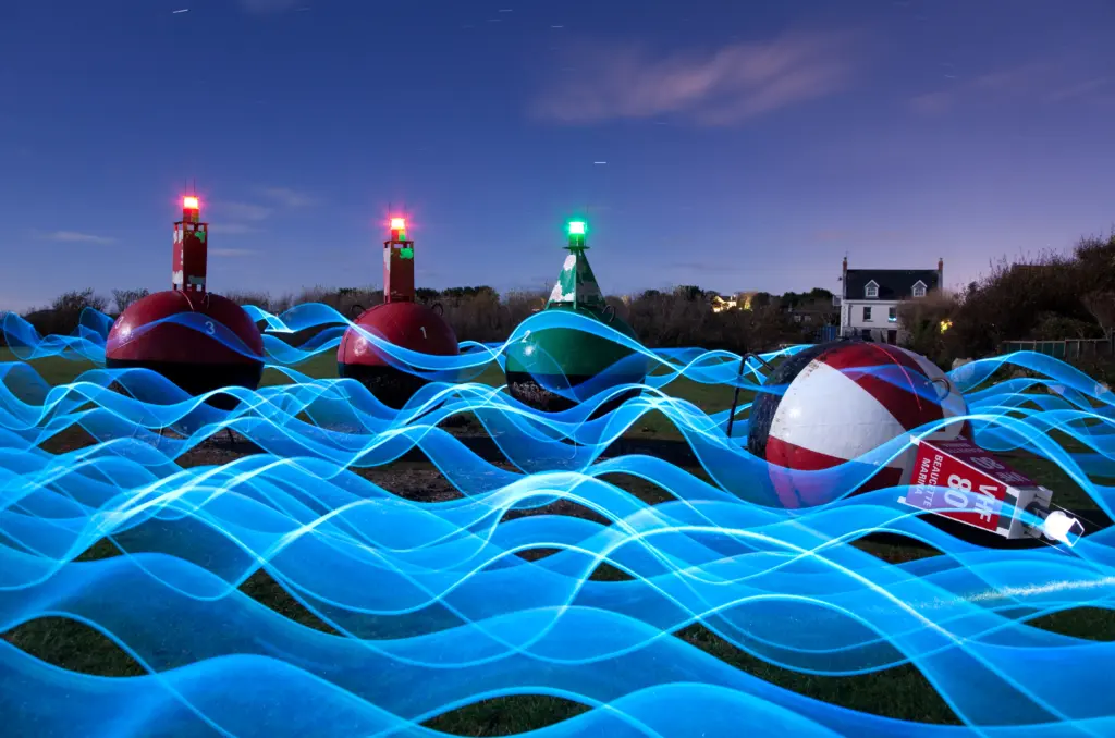 Blue light painting wave created using professional light painting tools