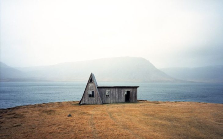 A small house in the middle of healthy surrounding