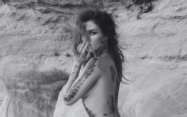 black and white photo of a nude women
